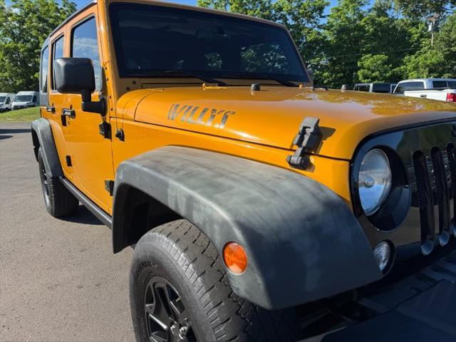 used 2014 Jeep Wrangler Unlimited car, priced at $12,900