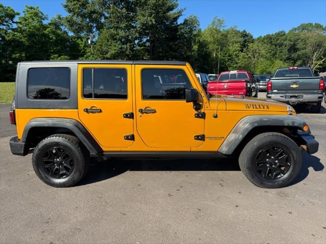 used 2014 Jeep Wrangler Unlimited car, priced at $12,900