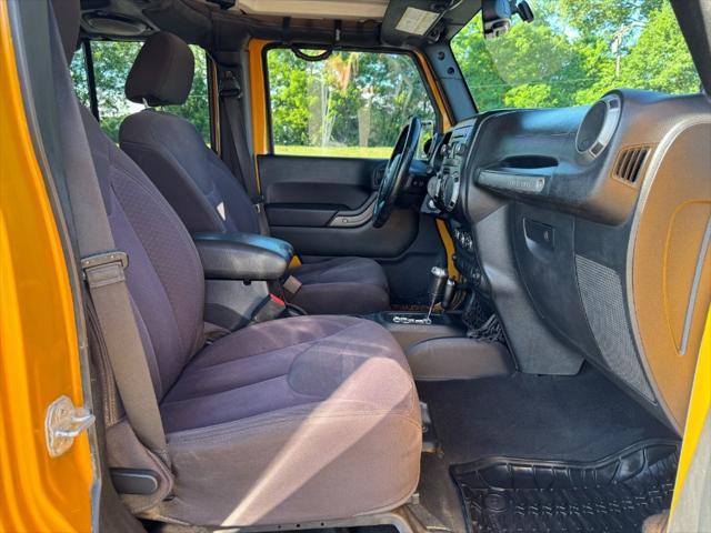 used 2014 Jeep Wrangler Unlimited car, priced at $12,900