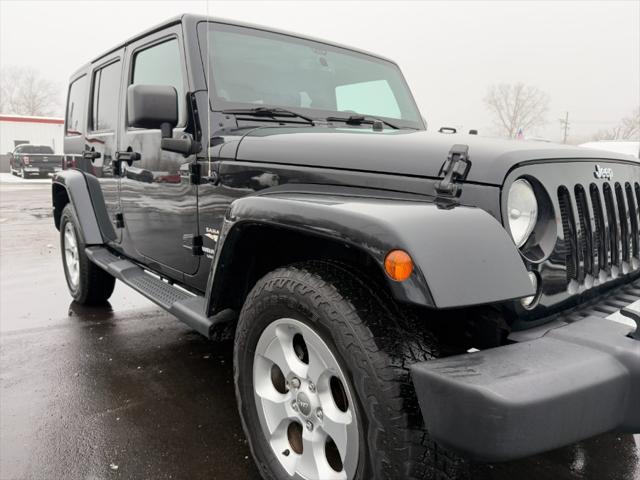 used 2014 Jeep Wrangler Unlimited car, priced at $12,900