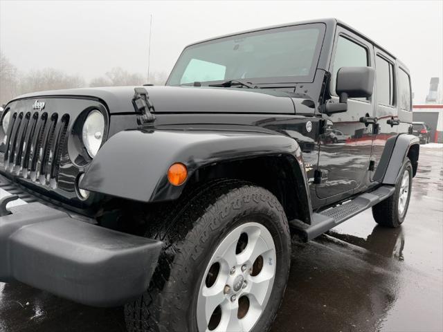 used 2014 Jeep Wrangler Unlimited car, priced at $12,900