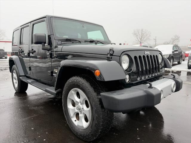 used 2014 Jeep Wrangler Unlimited car, priced at $12,900