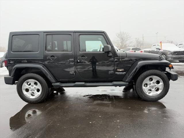 used 2014 Jeep Wrangler Unlimited car, priced at $12,900