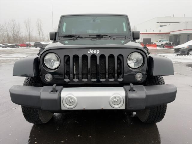 used 2014 Jeep Wrangler Unlimited car, priced at $12,900