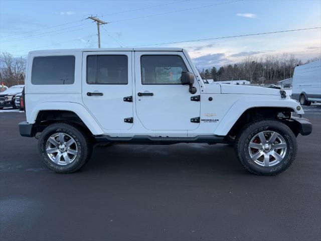 used 2015 Jeep Wrangler Unlimited car, priced at $12,900