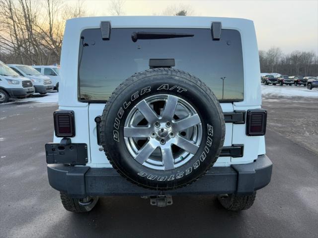 used 2015 Jeep Wrangler Unlimited car, priced at $12,900