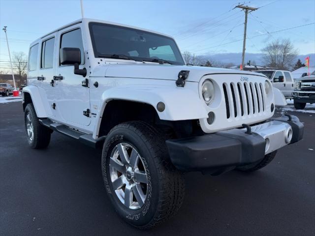 used 2015 Jeep Wrangler Unlimited car, priced at $12,900