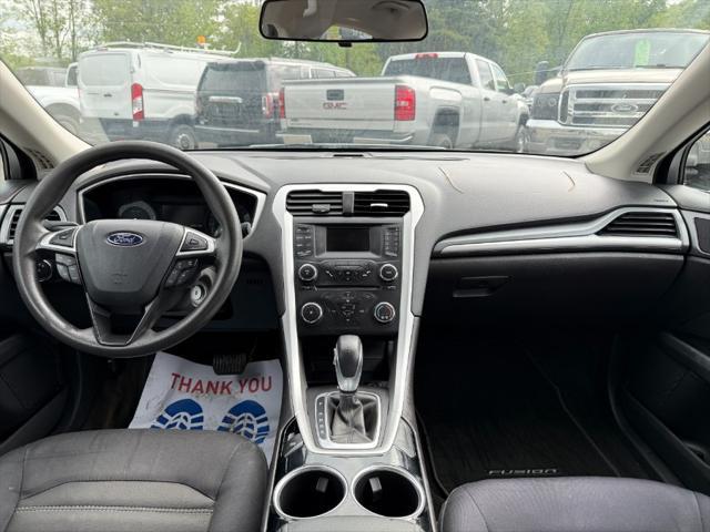 used 2014 Ford Fusion car, priced at $4,900