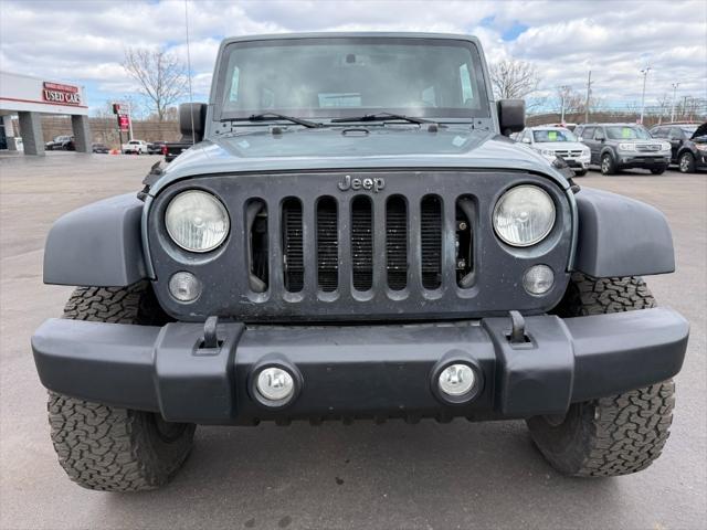 used 2014 Jeep Wrangler Unlimited car, priced at $14,900