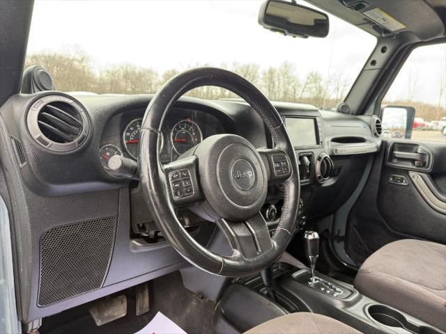 used 2014 Jeep Wrangler Unlimited car, priced at $14,900