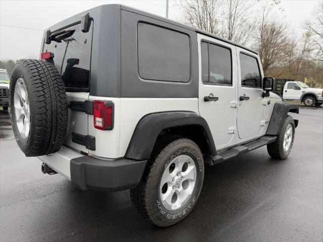 used 2010 Jeep Wrangler Unlimited car, priced at $9,900