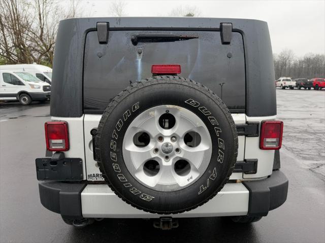 used 2010 Jeep Wrangler Unlimited car, priced at $9,900