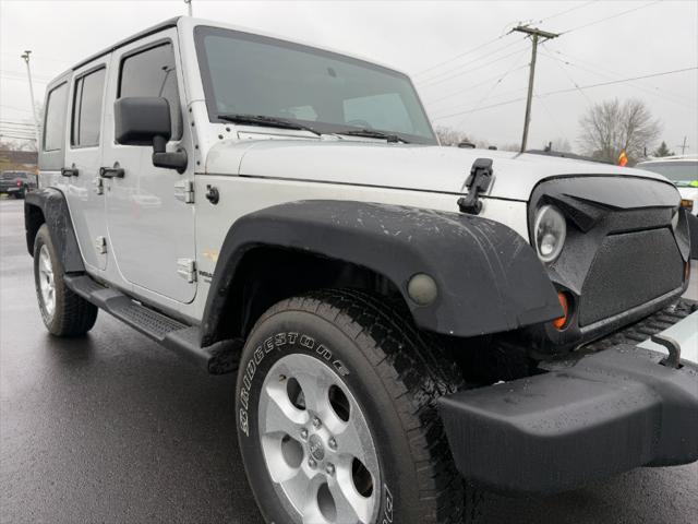 used 2010 Jeep Wrangler Unlimited car, priced at $9,900