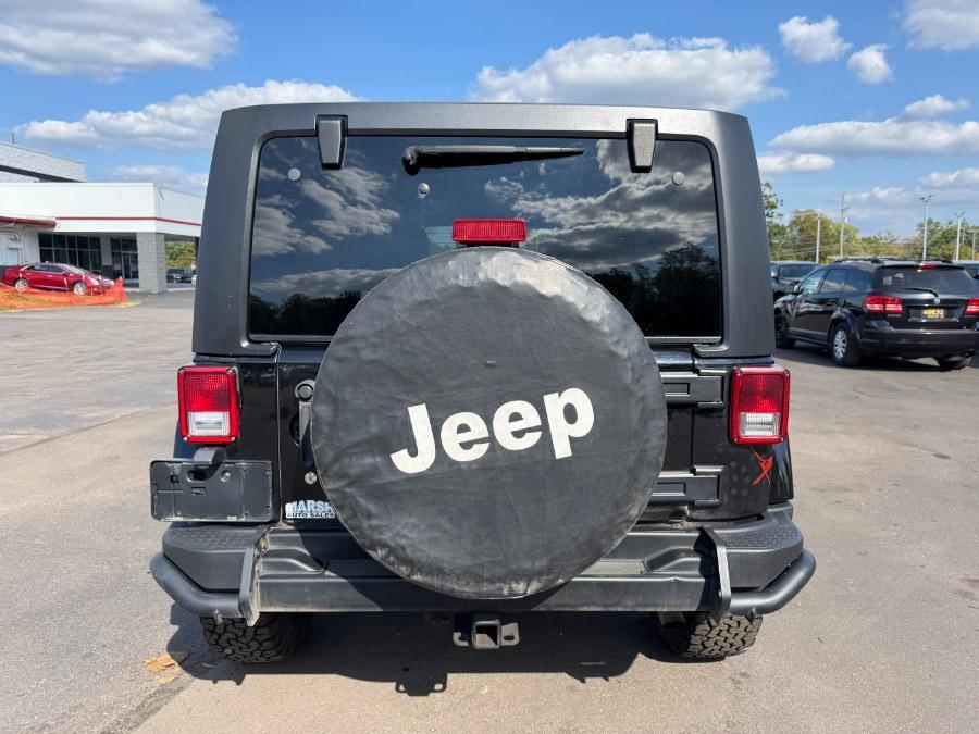 used 2016 Jeep Wrangler Unlimited car, priced at $13,900