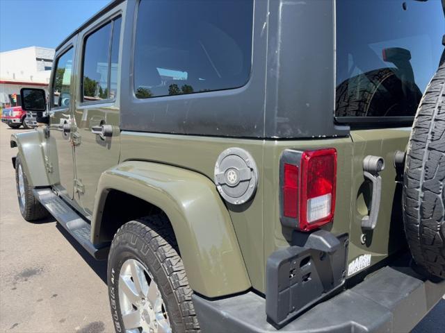 used 2015 Jeep Wrangler Unlimited car, priced at $14,900