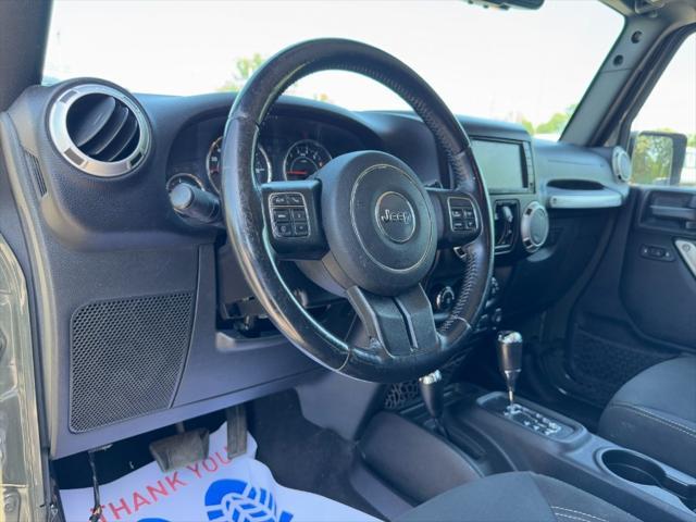 used 2015 Jeep Wrangler Unlimited car, priced at $14,900