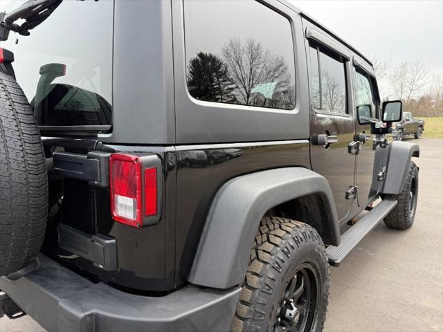 used 2014 Jeep Wrangler Unlimited car, priced at $14,900