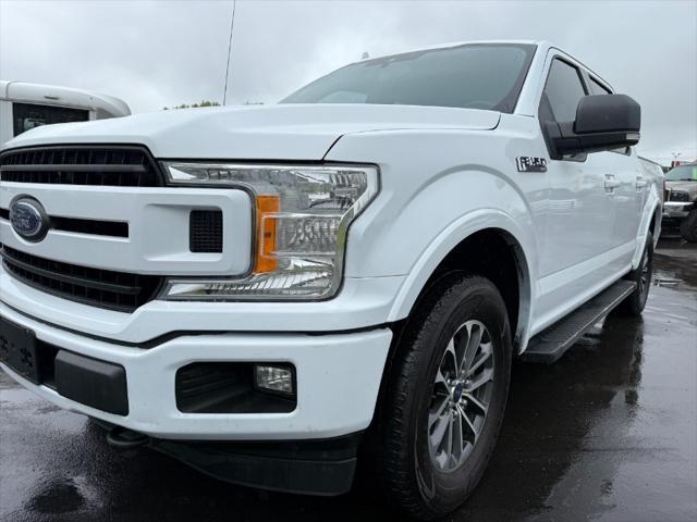 used 2018 Ford F-150 car, priced at $13,900