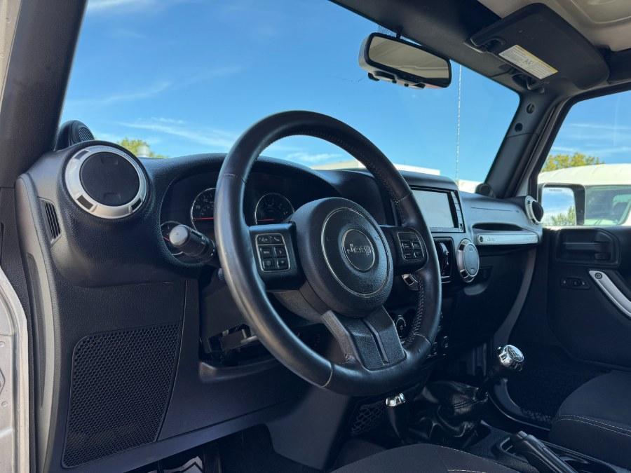 used 2014 Jeep Wrangler Unlimited car, priced at $9,900