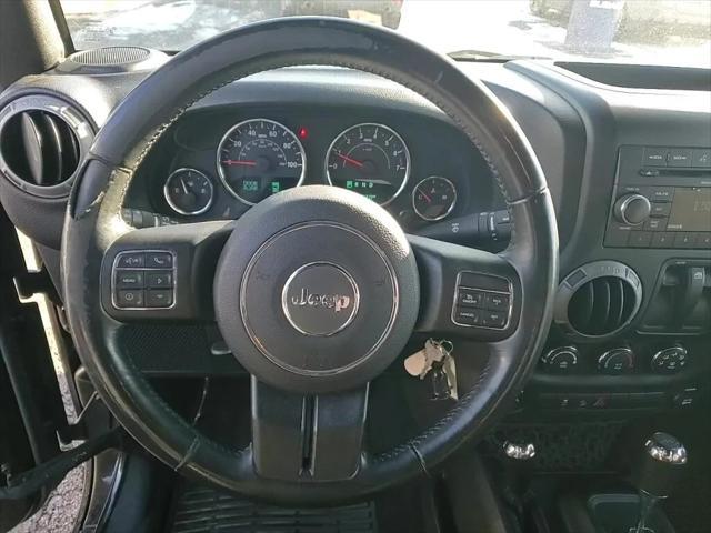 used 2015 Jeep Wrangler car, priced at $17,081