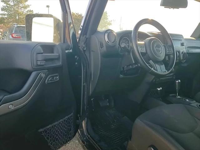 used 2015 Jeep Wrangler car, priced at $17,081