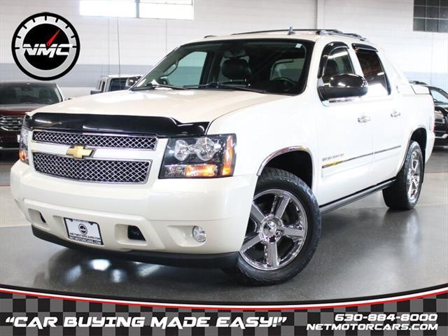 used 2013 Chevrolet Avalanche car, priced at $26,550