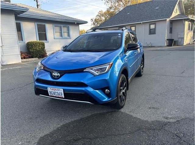 used 2018 Toyota RAV4 Hybrid car, priced at $25,995