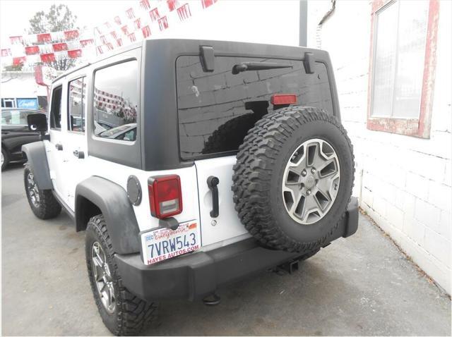 used 2013 Jeep Wrangler Unlimited car, priced at $21,795