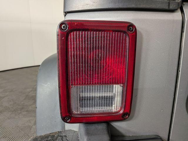 used 2014 Jeep Wrangler Unlimited car, priced at $22,488