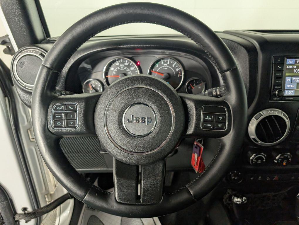 used 2015 Jeep Wrangler Unlimited car, priced at $21,488