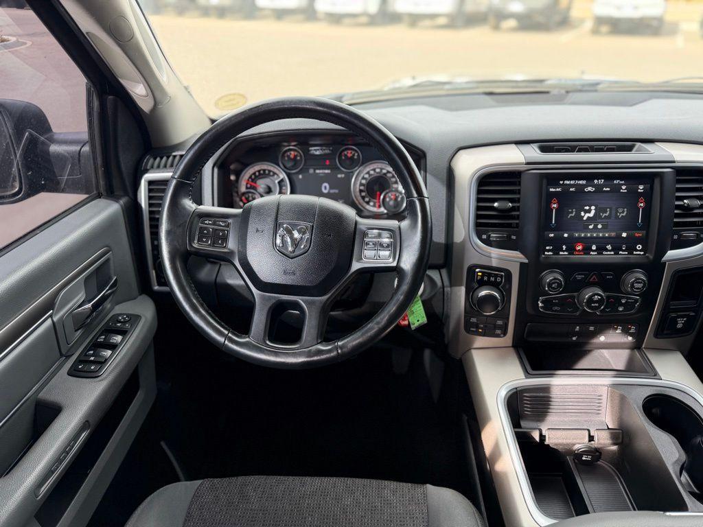 used 2018 Ram 1500 car, priced at $25,828