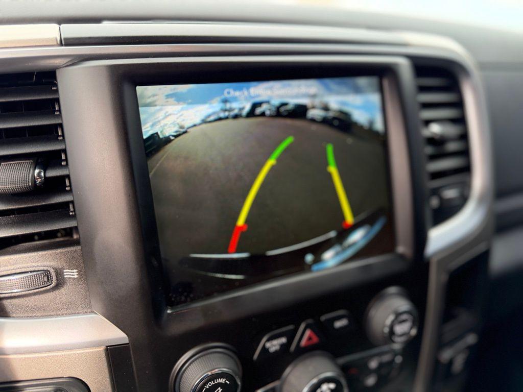 used 2018 Ram 1500 car, priced at $25,828