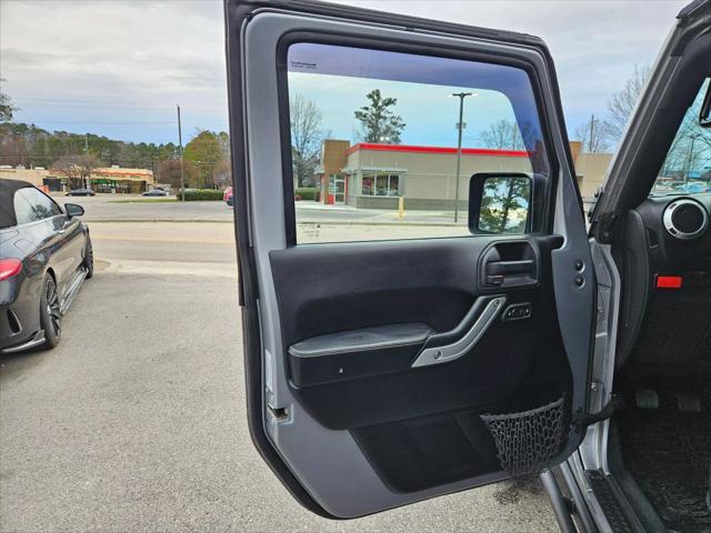 used 2015 Jeep Wrangler Unlimited car, priced at $15,999