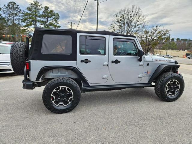 used 2015 Jeep Wrangler Unlimited car, priced at $15,999