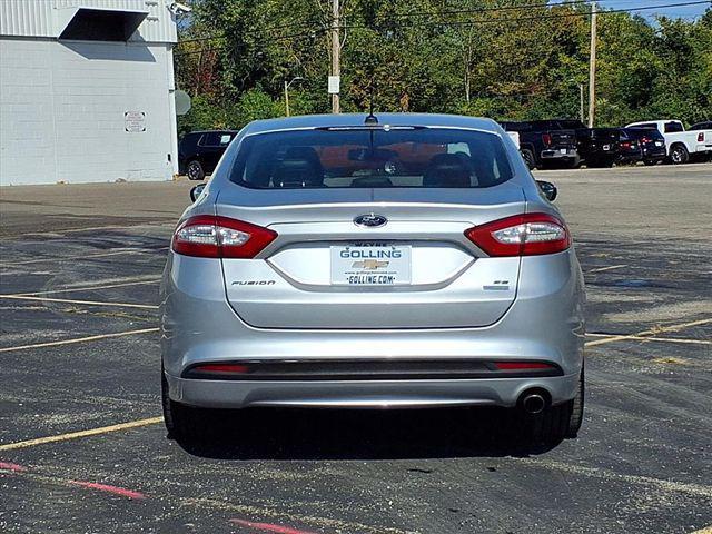 used 2014 Ford Fusion car, priced at $6,980
