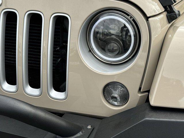 used 2016 Jeep Wrangler Unlimited car, priced at $26,998