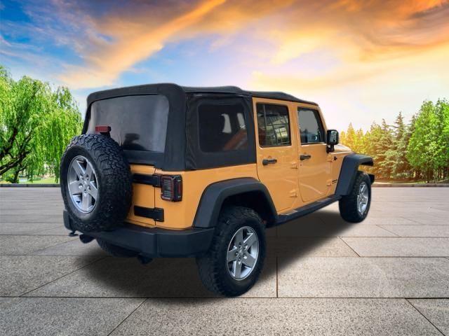 used 2012 Jeep Wrangler Unlimited car, priced at $15,998