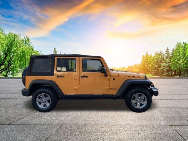 used 2012 Jeep Wrangler Unlimited car, priced at $15,998