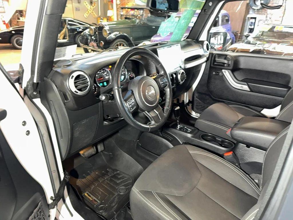 used 2015 Jeep Wrangler car, priced at $16,996
