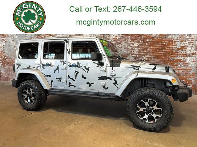 used 2012 Jeep Wrangler Unlimited car, priced at $14,996