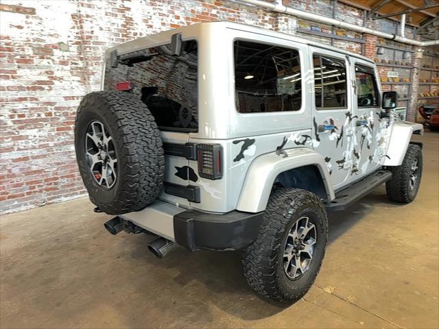 used 2012 Jeep Wrangler Unlimited car, priced at $14,996