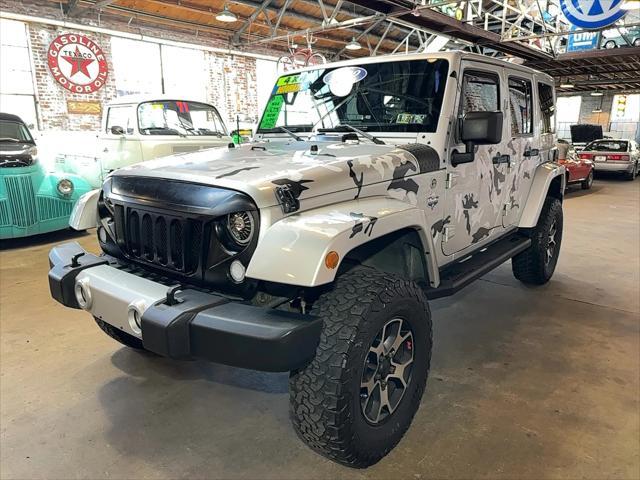 used 2012 Jeep Wrangler Unlimited car, priced at $14,996