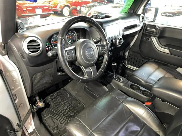 used 2012 Jeep Wrangler Unlimited car, priced at $14,996