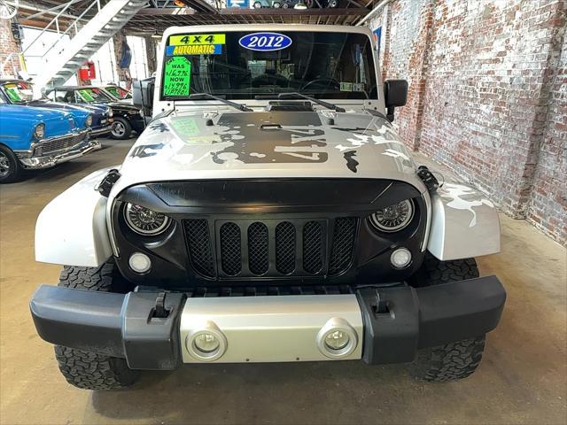 used 2012 Jeep Wrangler Unlimited car, priced at $14,996