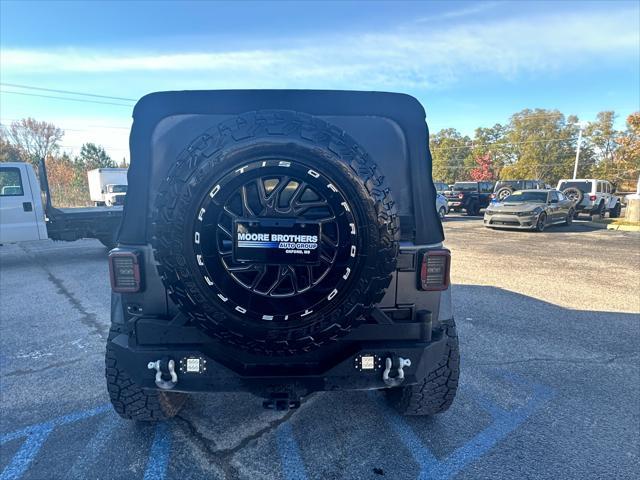 used 2016 Jeep Wrangler Unlimited car, priced at $19,870