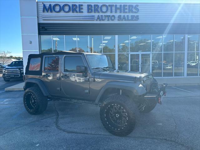 used 2016 Jeep Wrangler Unlimited car, priced at $19,870