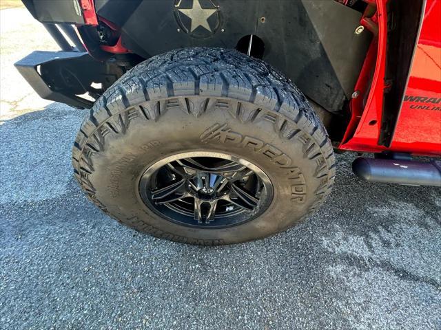used 2014 Jeep Wrangler Unlimited car, priced at $19,769