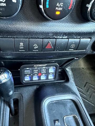 used 2014 Jeep Wrangler Unlimited car, priced at $19,769