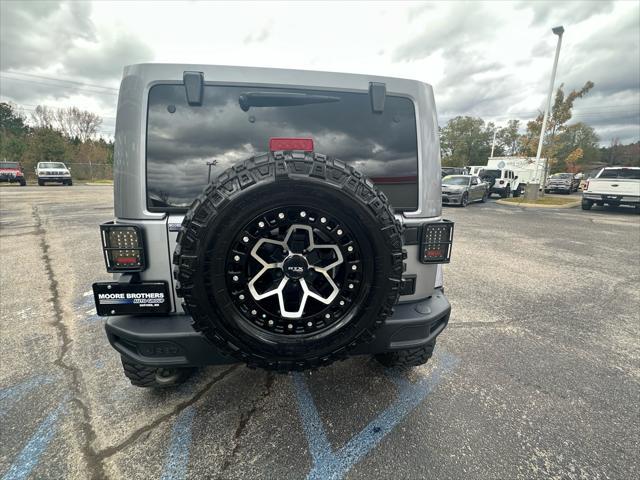 used 2018 Jeep Wrangler JK Unlimited car, priced at $26,870