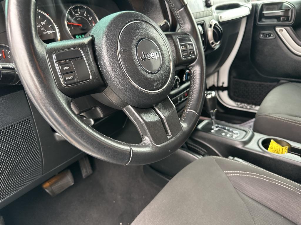 used 2018 Jeep Wrangler JK Unlimited car, priced at $23,779